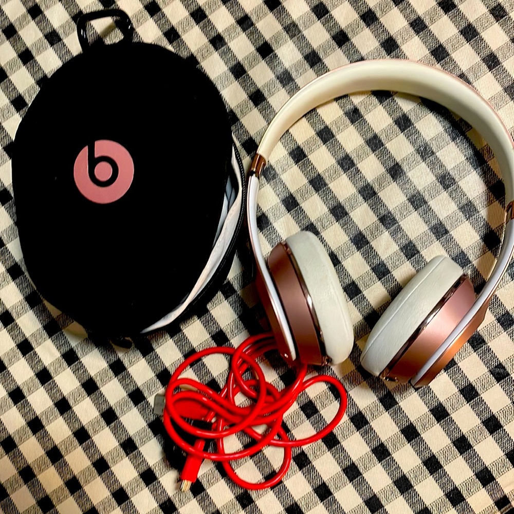 Rose Gold Solo Beats wireless headphones. Like new